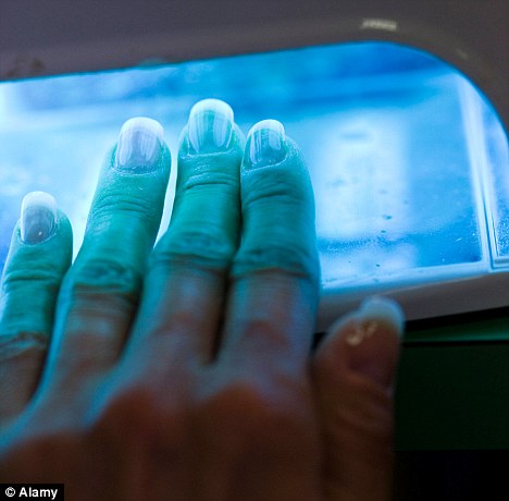 Perfect polish: UV light is used to seal the varnish for a lasting finish in the shellac manicure