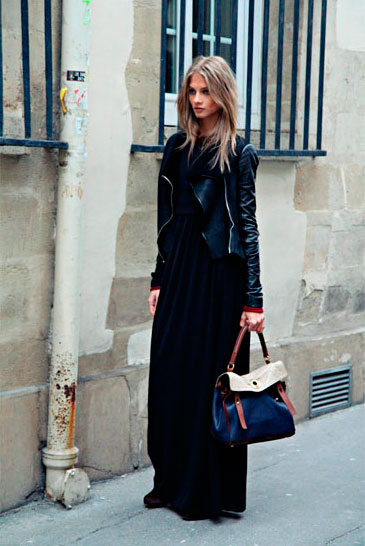 Девушка в черном платье и кожаной куртке
