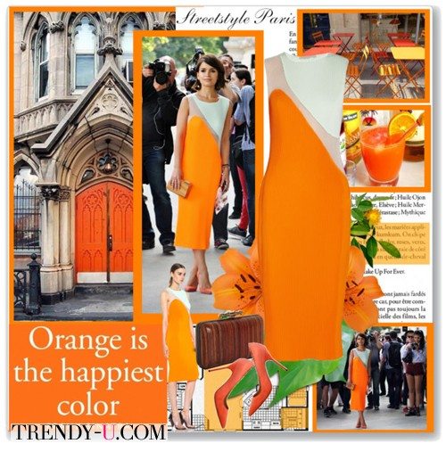Мирослава Дума в оранжевом платье