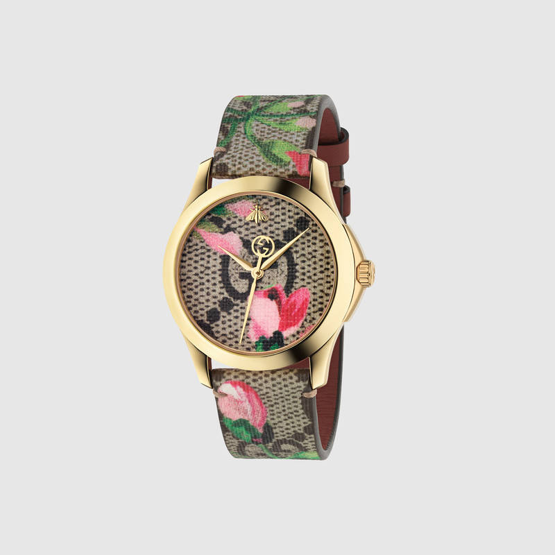Женские часы с цветочным рисунком. Модель Gucci