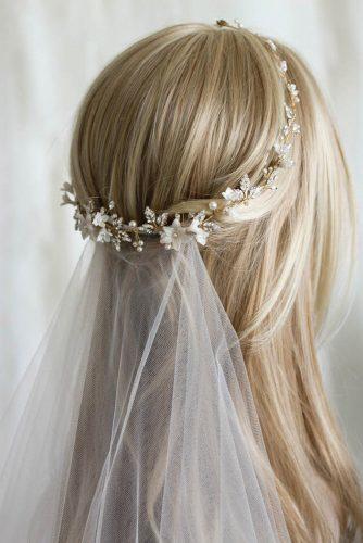 wedding hairstyles with veil gentle half up half down with gold halo taniamarasbridal