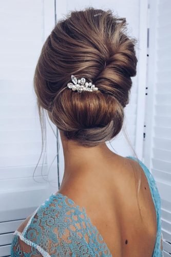 wedding updos elegant swept low bun with pearly pin ksenya_makeup