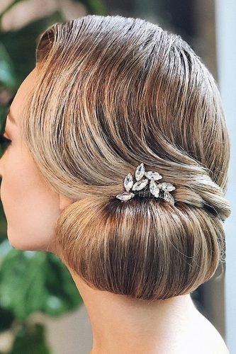 wedding updos smooth classy side chignon with crystal hairspin hairandmakeupbysteph