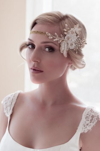 wedding hairstyle ideas for short hair low bun on blonde with baby breath hairbyhannahtaylor